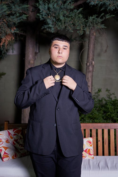 Photo of a Confident Young Man in a Navy Suit