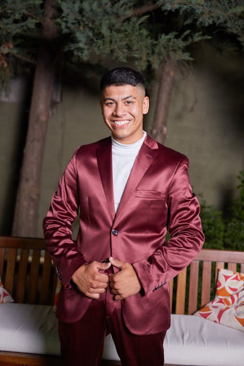 A Man Wearing a Burgundy Suit