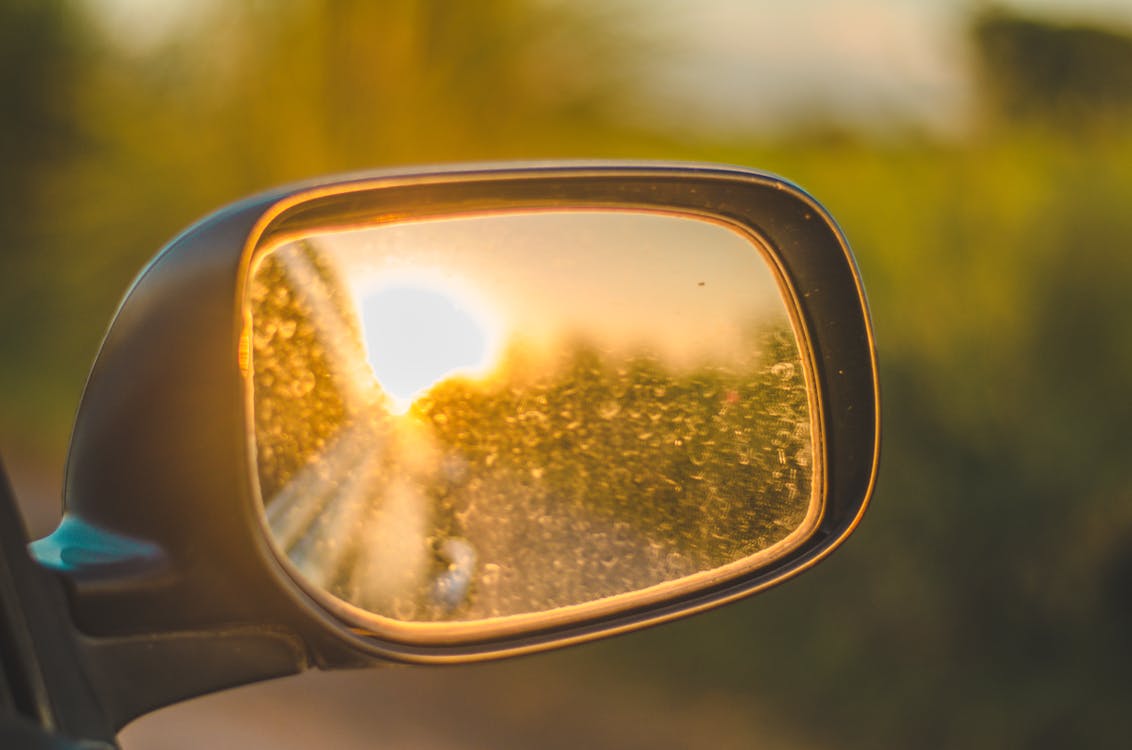 Free stock photo of car mirror, dirty mirror, evening sun