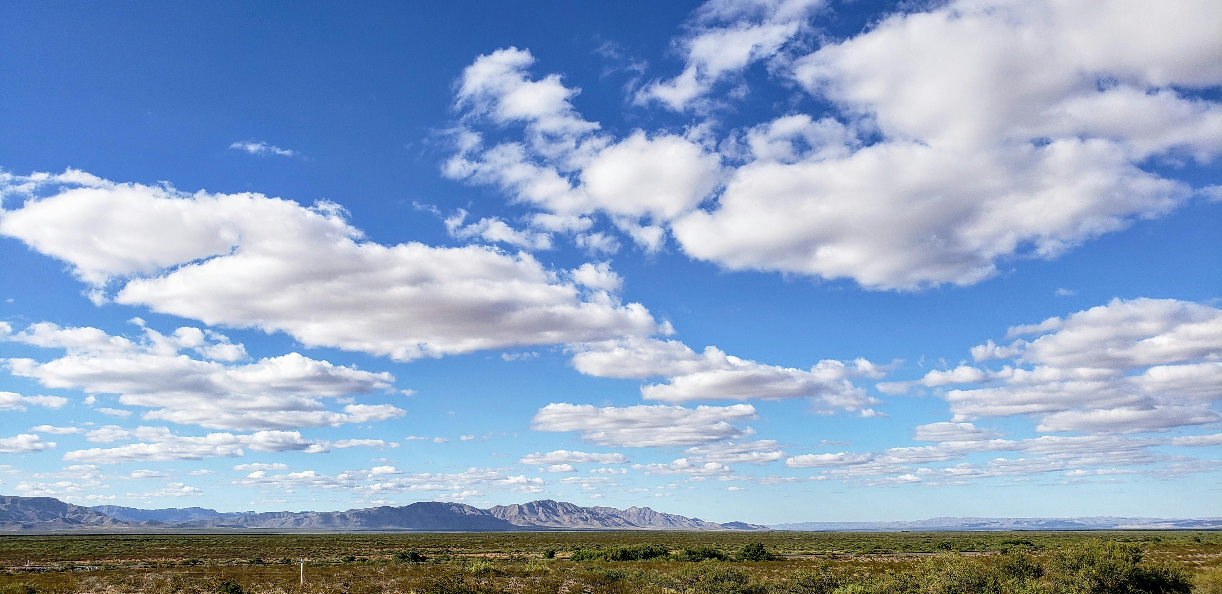 Free stock photo of mountain sky blue clouds desert
