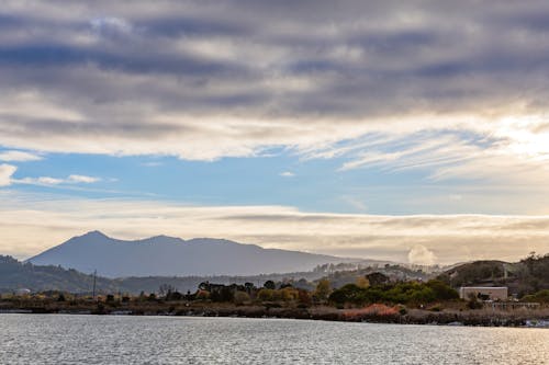 Photos gratuites de aube, fleuve, montagnes