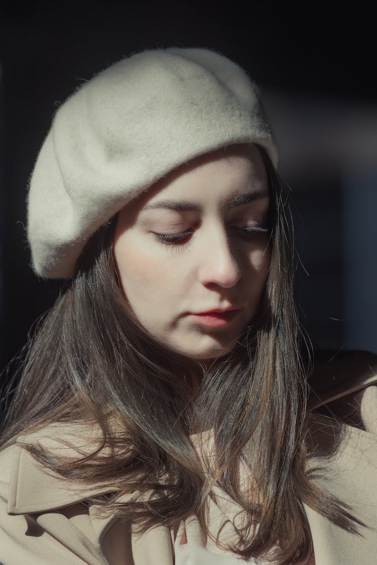 Close-up Of A Beautiful Woman With A Hat