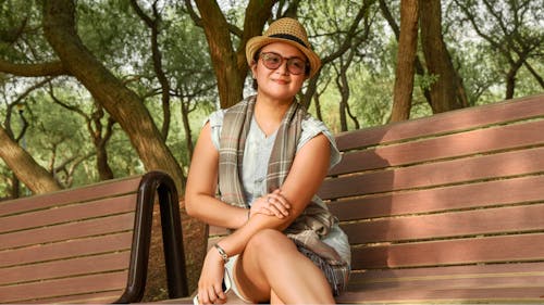 Free Photo of Woman Sitting On A Bench Stock Photo