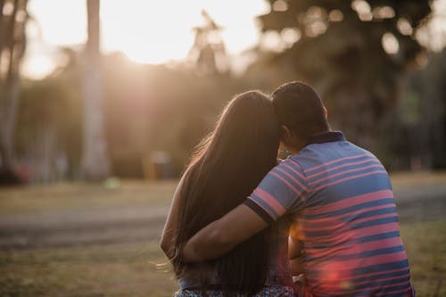 Man Embracing Woman