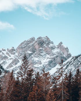 Majestic snow-covered peaks of Lienzer Dolomiten in Tirol, Austria, captured in serene winter light.