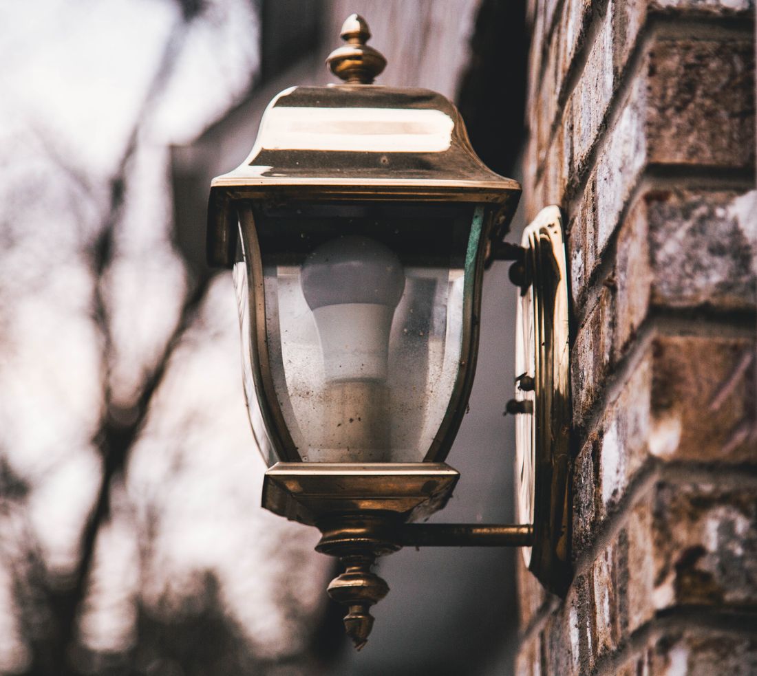Wall sconce shallow focus photography