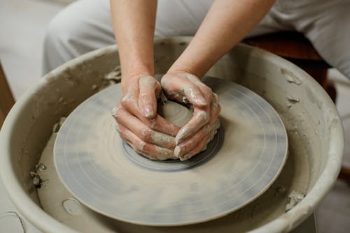 Woman Hands Making Clay Pot