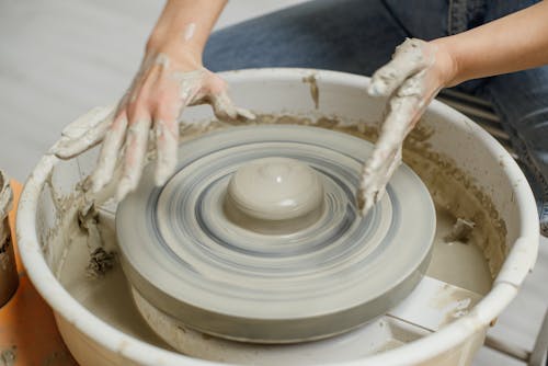 A Person Making a Pot