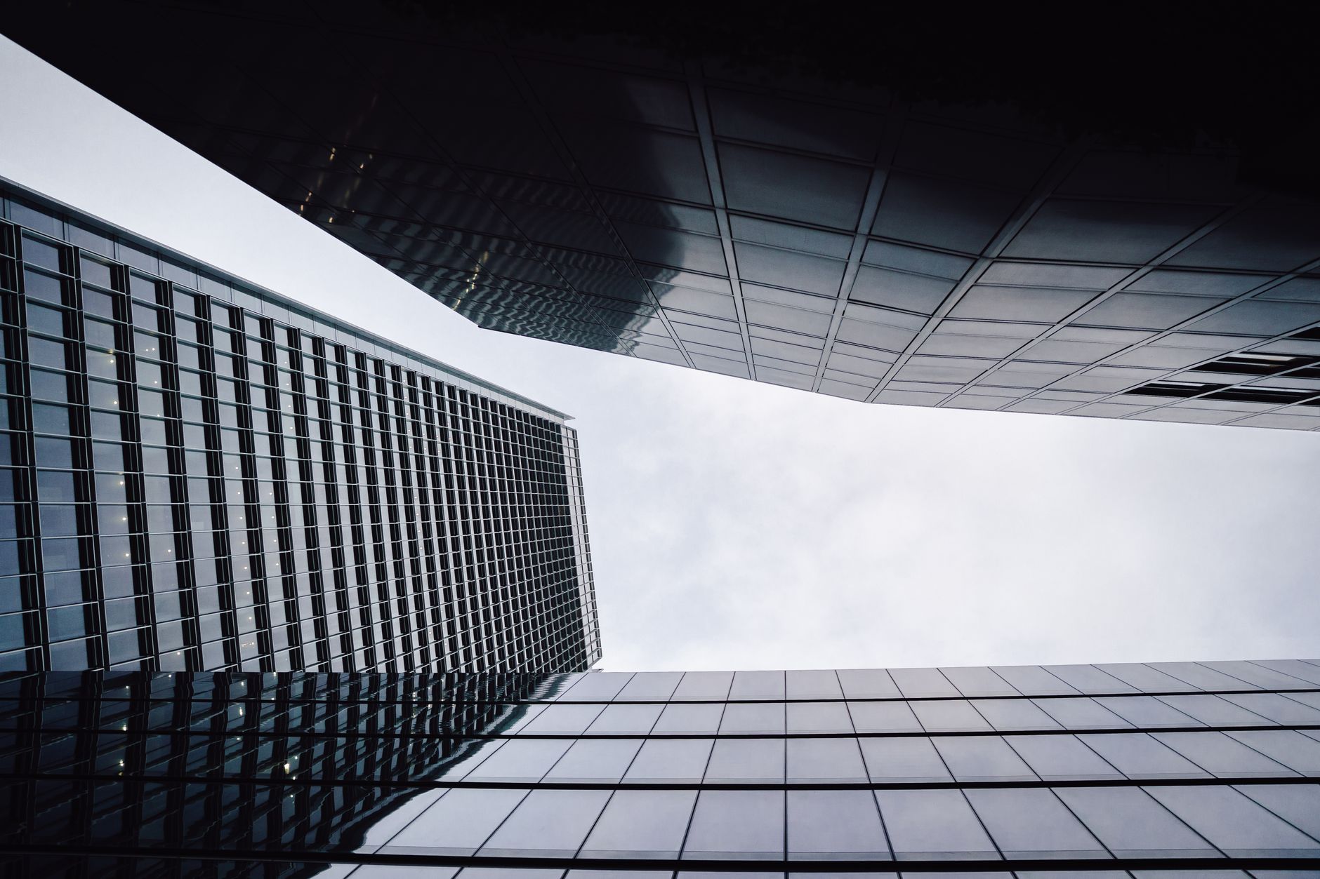 A sophisticated minimalist office interior overlooking a global financial skyline, representing strategic asset oversight and clarity.