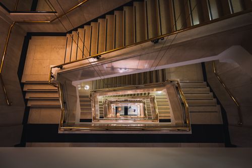 Free A captivating view of a spiral staircase in a modern building in London, UK. Stock Photo