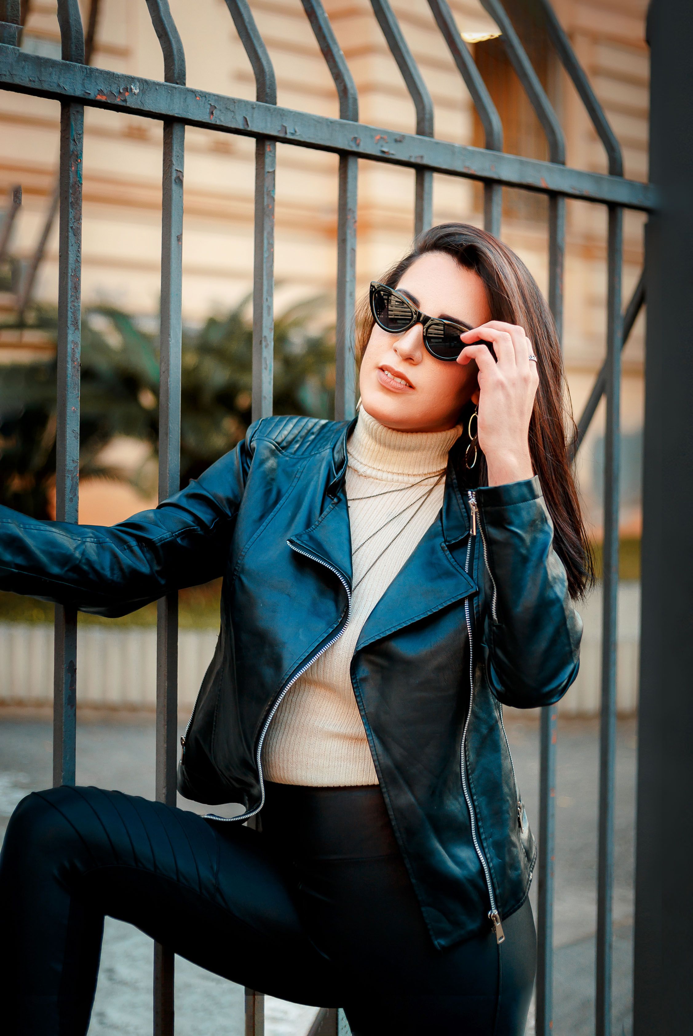 A Woman in Black Leather Jacket and Black Sunglasses Posing · Free ...
