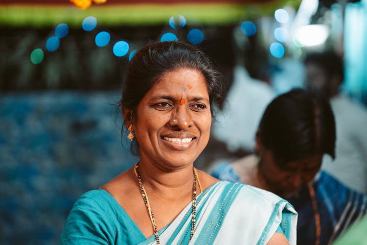 Mature Woman Wearing A Saree 