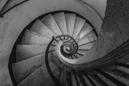Black and White Photo of a Spiral Staircase