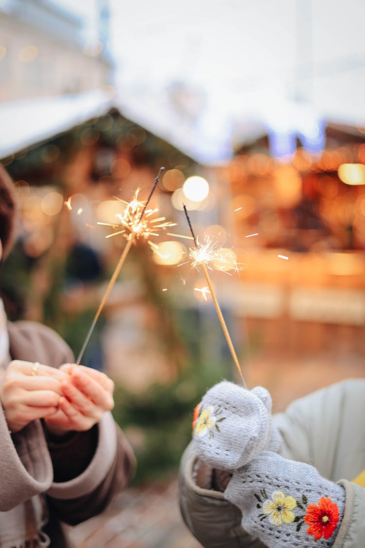 Hands Holding Sparklers