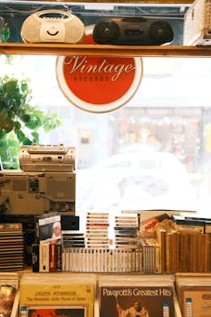 Cozy vintage record store showing an eclectic collection of classic music albums and retro devices.