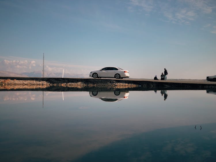 Running White Car