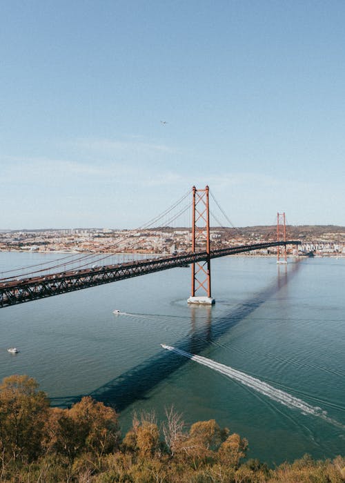 View of the 25 de Abril Bridge over the Tagus River in Lisbon, Portugal