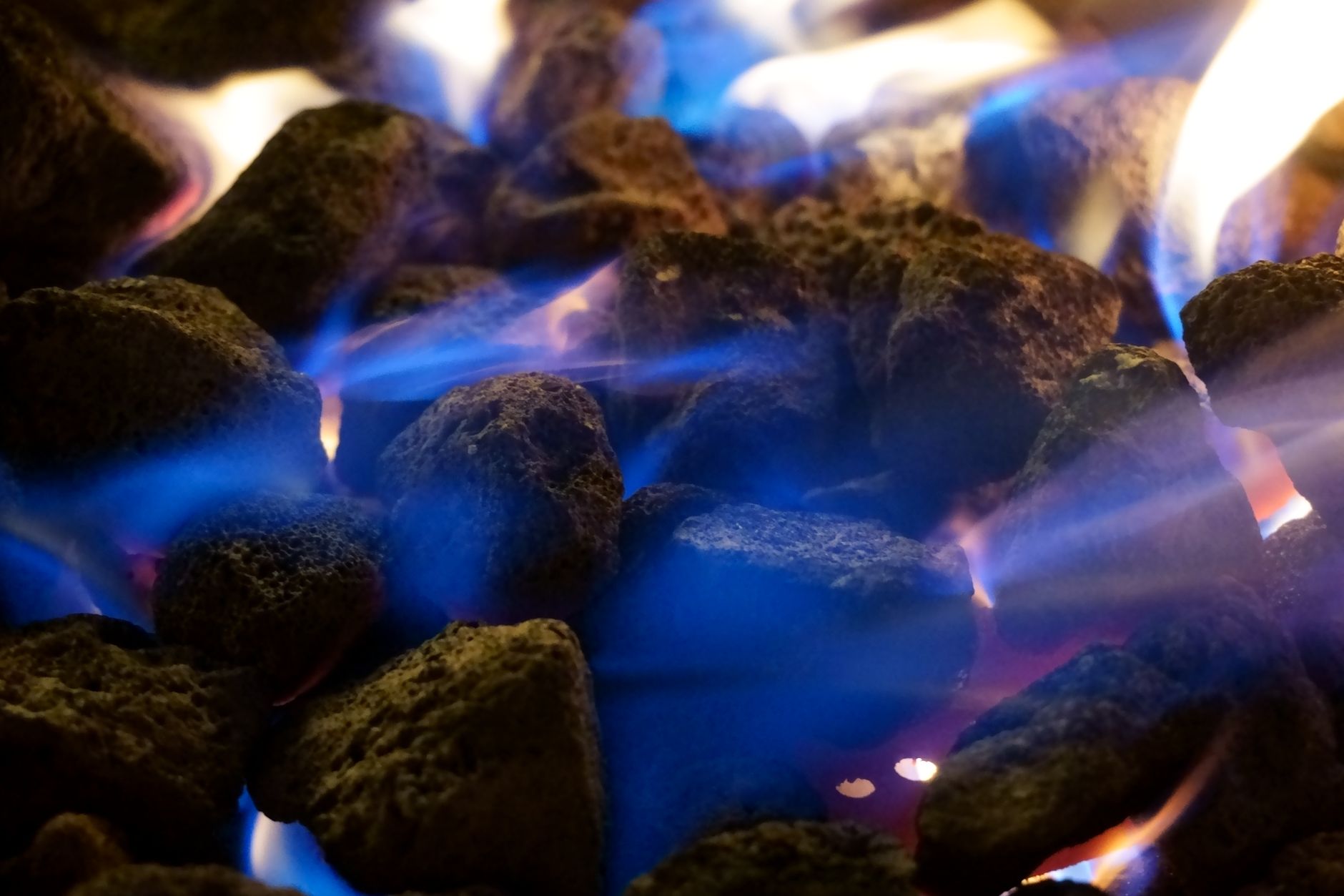 Blue and orange gas fireplace flames — professional gas fireplace repair service in California