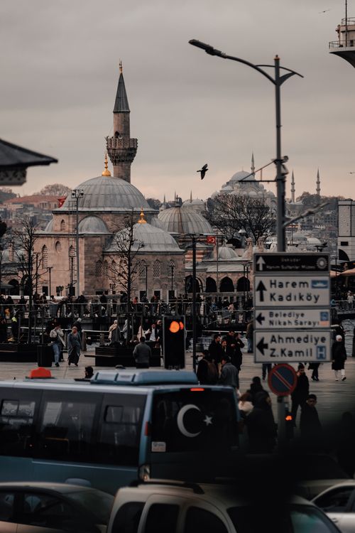 Free A lively Istanbul street scene with Semsi Pasha Mosque, showcasing Ottoman architecture and city life. Stock Photo