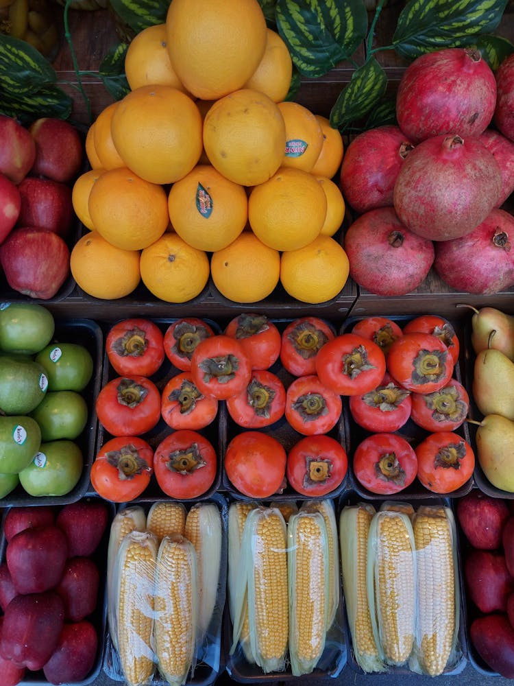 Stacks Of Vegetables And Fruits In A Market Stall