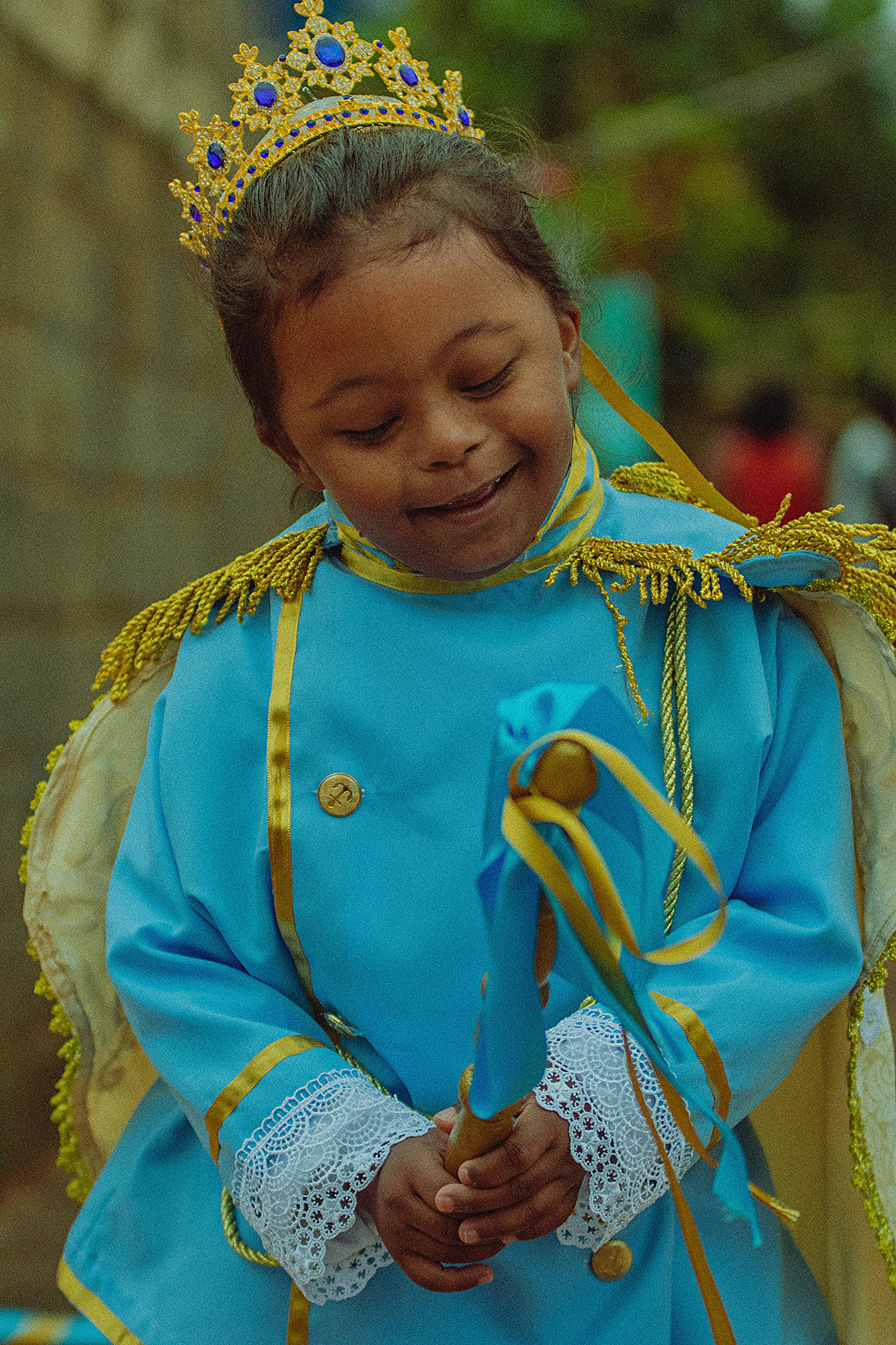 portrait of girl wearing king costume