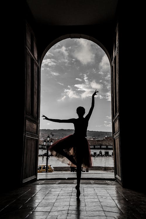Ballerina Dancing in Doorway
