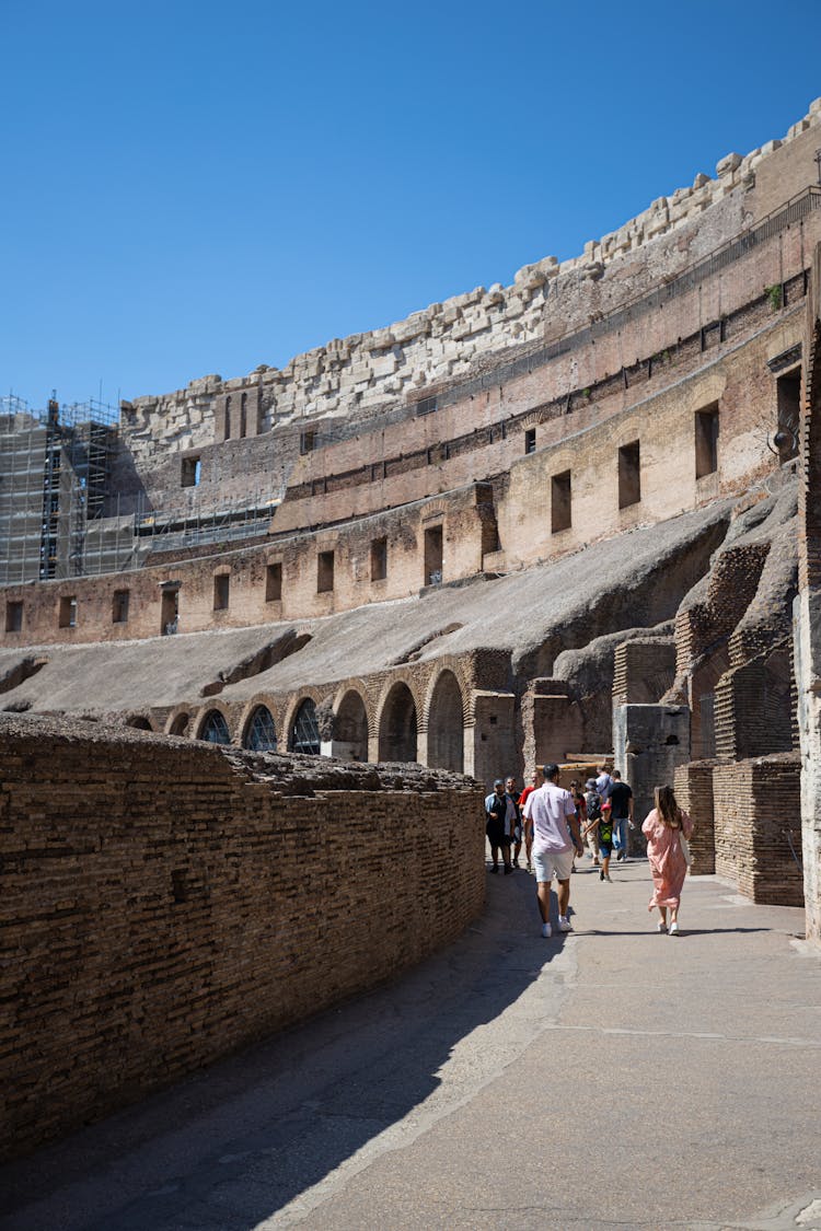 Tourists At The Colosseum In Rome