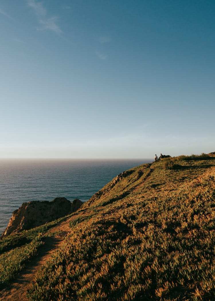 A Cliff With A View Of The Ocean