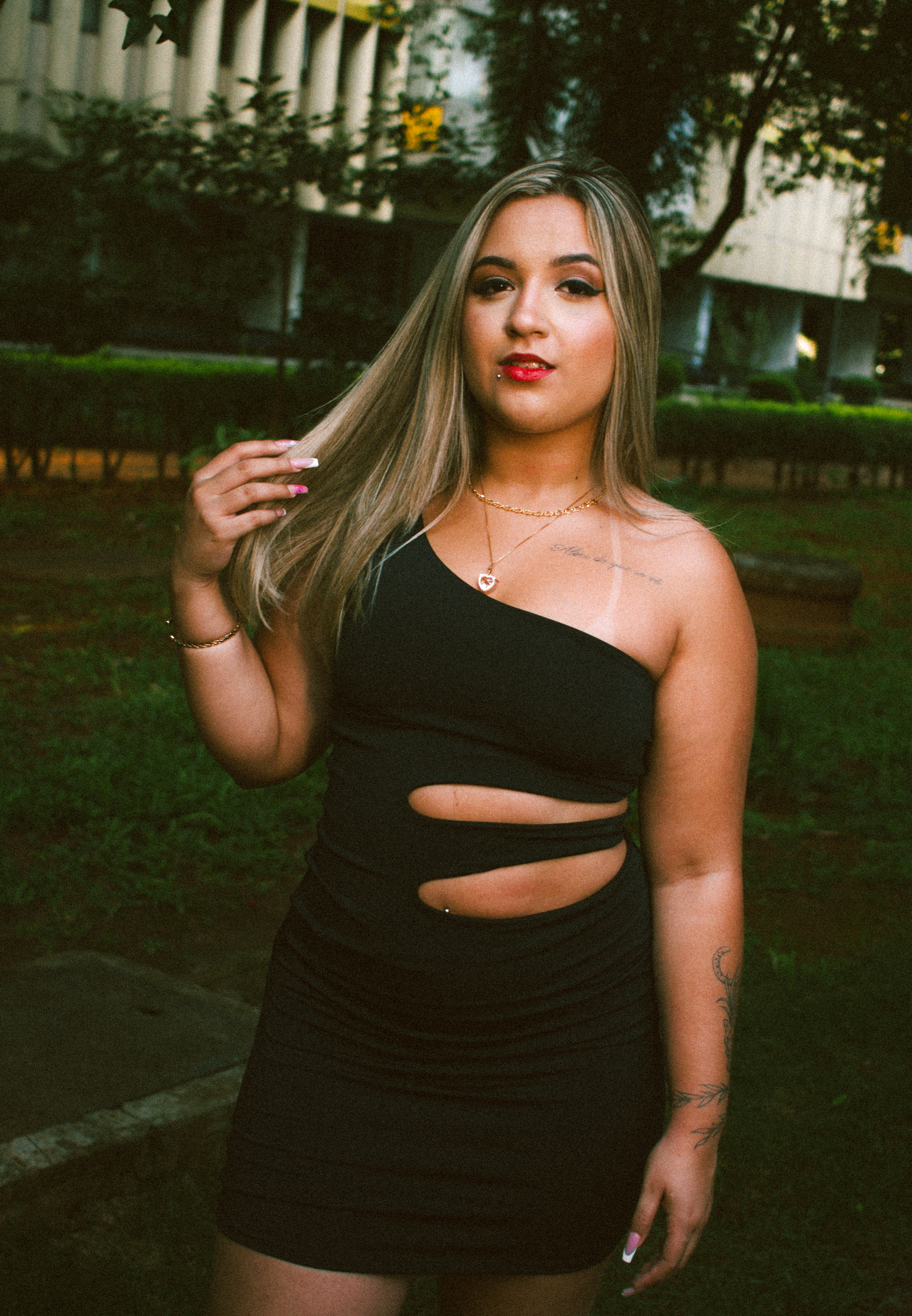 A Woman Wearing a Sexy Black Dress · Free Stock Photo