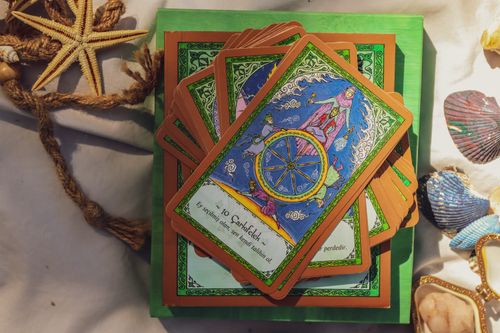 Free Mystical tarot cards surrounded by seashells and starfish, hinting at fortune telling. Stock Photo