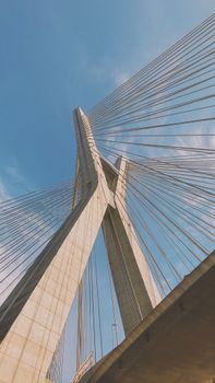 Low angle view of the iconic Ponte Estaiada cable-stayed bridge in São Paulo.