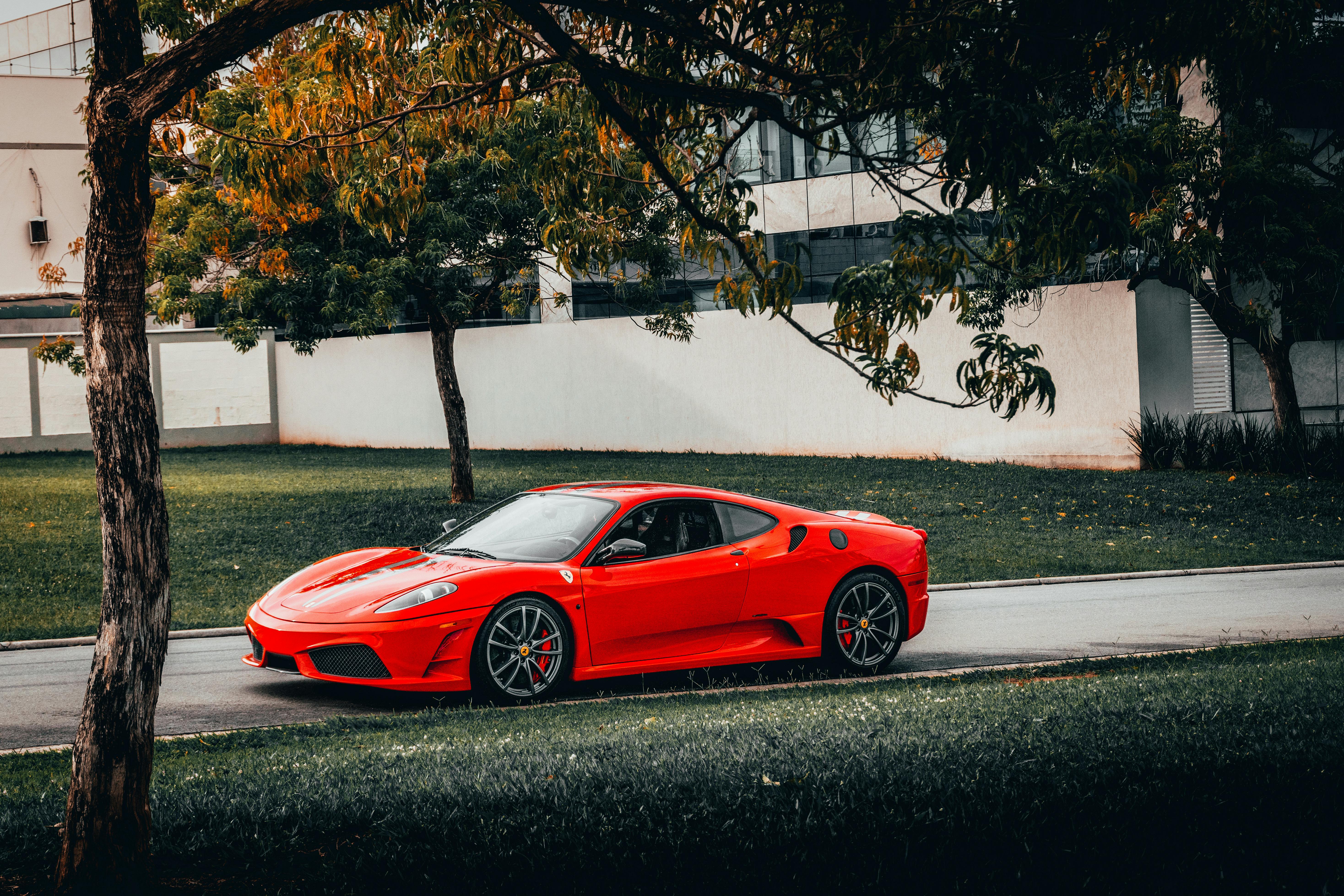 Red Car Parked on a Street · Free Stock Photo