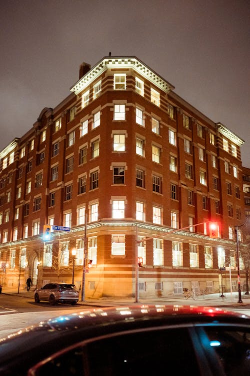 Illuminated Building on Night City Street