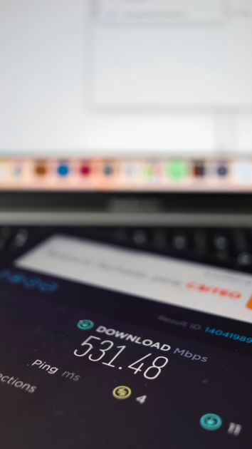 Internet speed test results on smartphone showing website performance metrics
