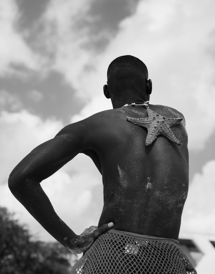 Starfish On Back Of A Man