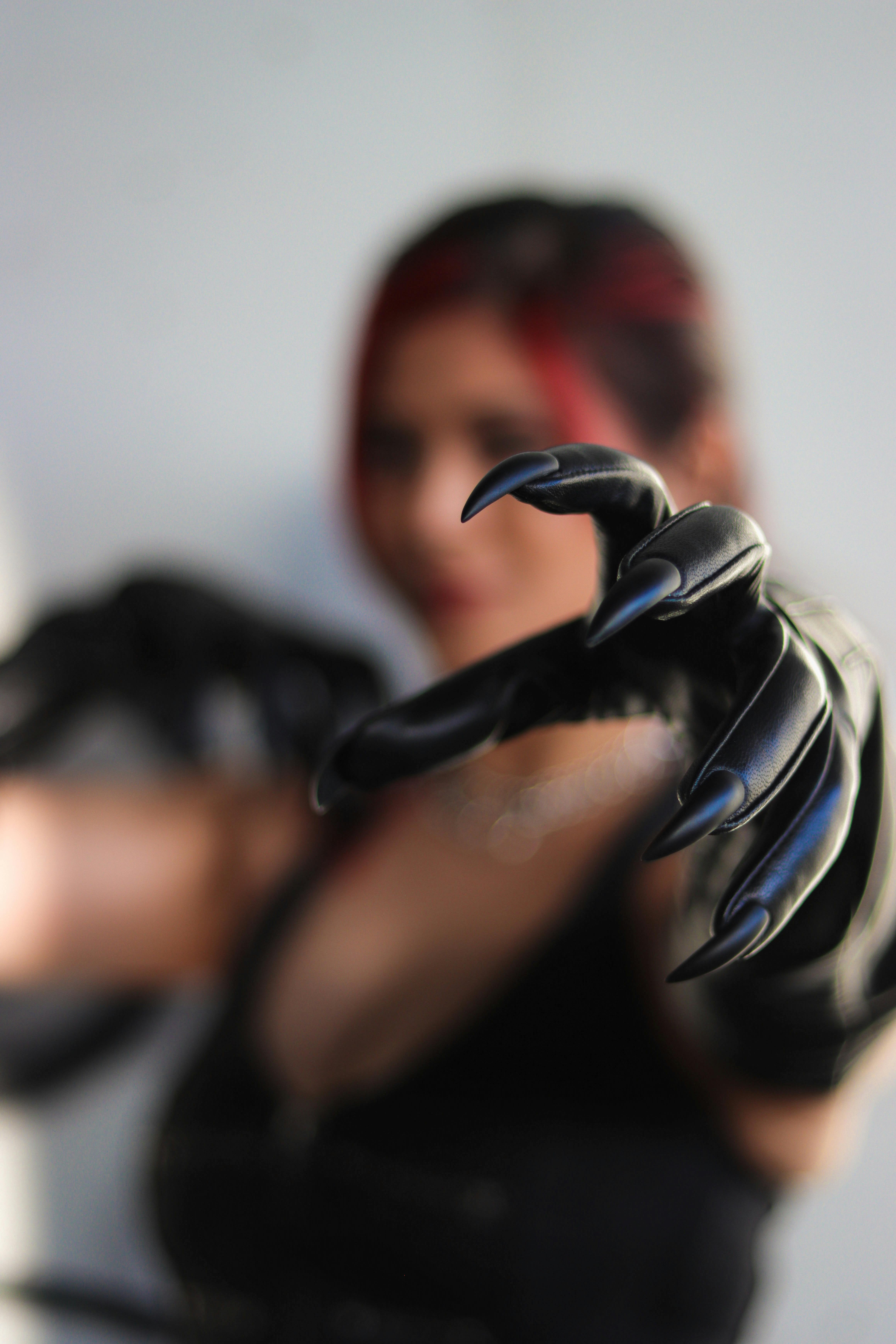 Free Woman Wearing Gloves with Claws the dark side of p*nography 