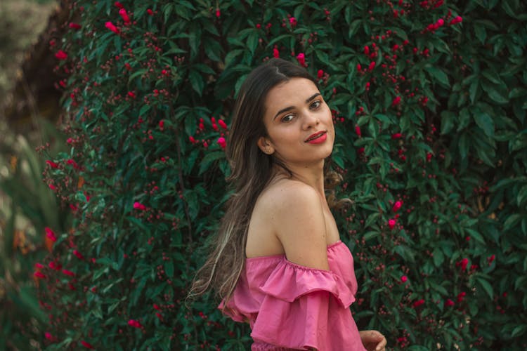 Beautiful Woman In Pink Off Shoulder Top