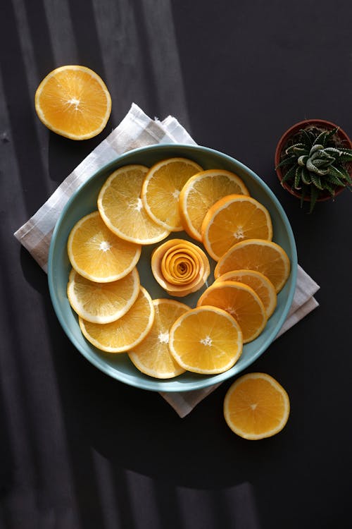 Orange Slices with Flower on Plate