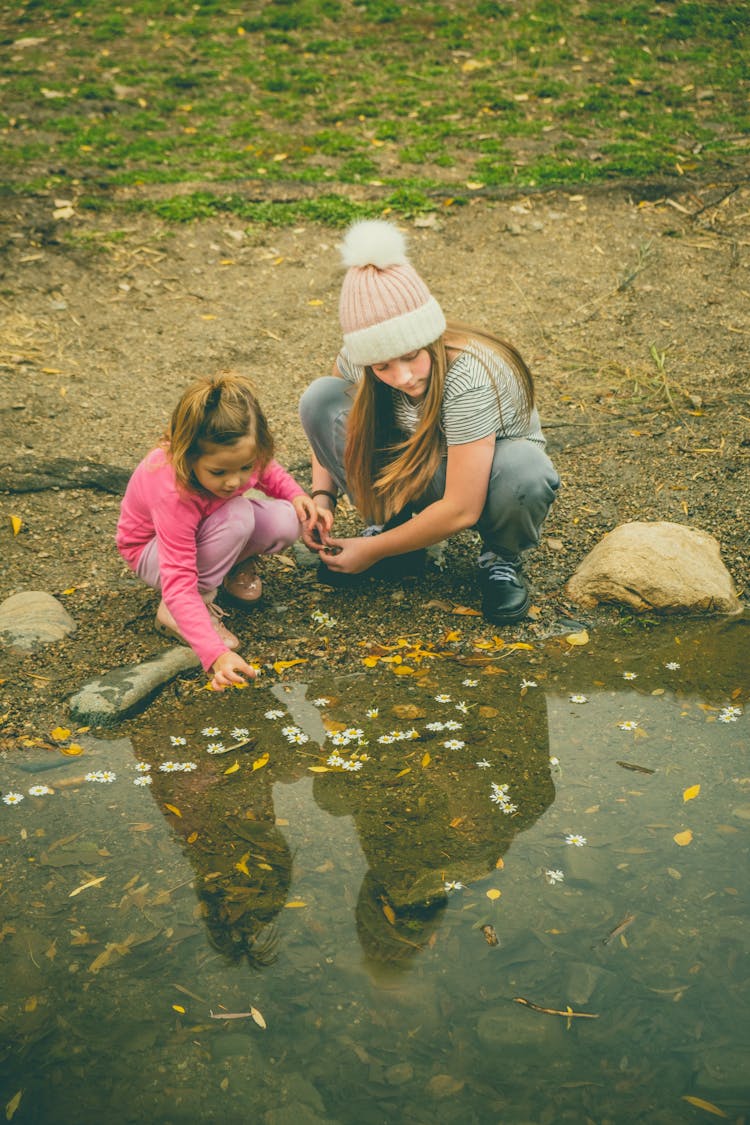 Kids Playing By The River