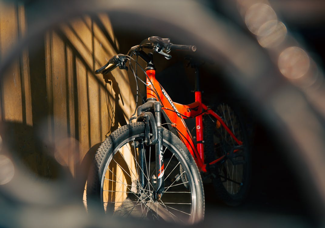 A Bicycle Parked Near the Wall