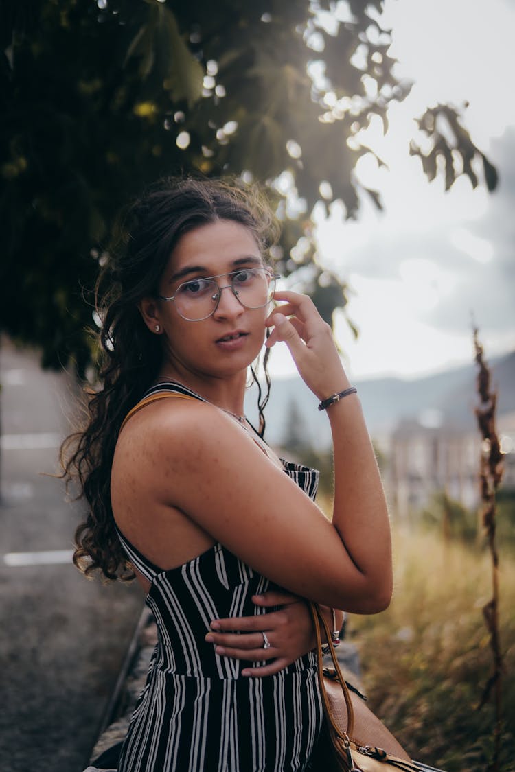 Woman Posing Near Tree