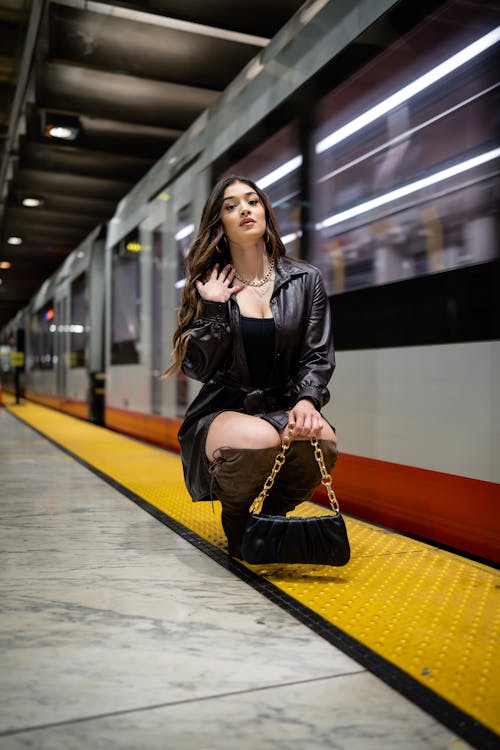 Woman Posing on Train Station Platform