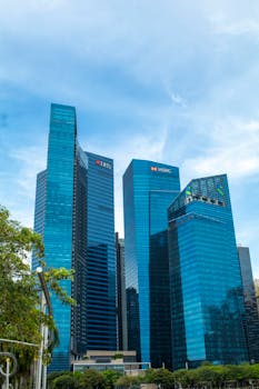Stunning low angle view of iconic skyscrapers in Singapore's financial hub.