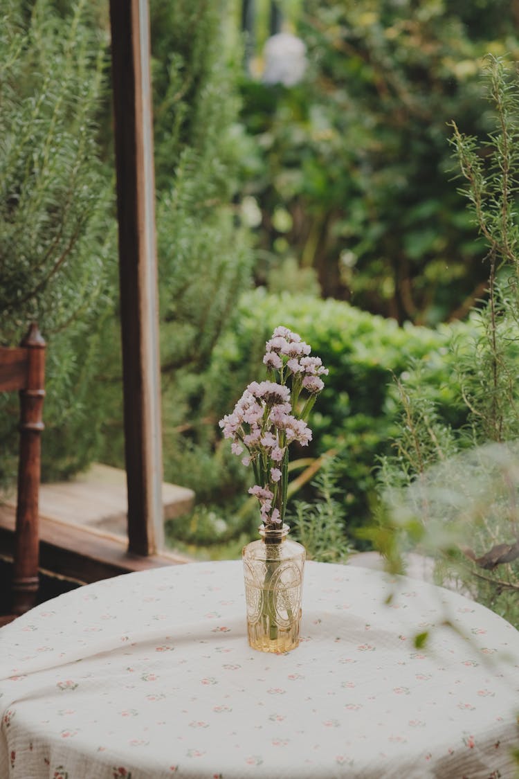 Flowers In Vase On Table