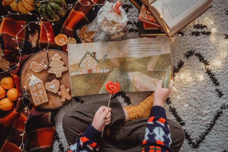 Child Reading A Book 