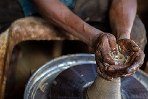 A Close-Up Shot of a Person doing Pottery