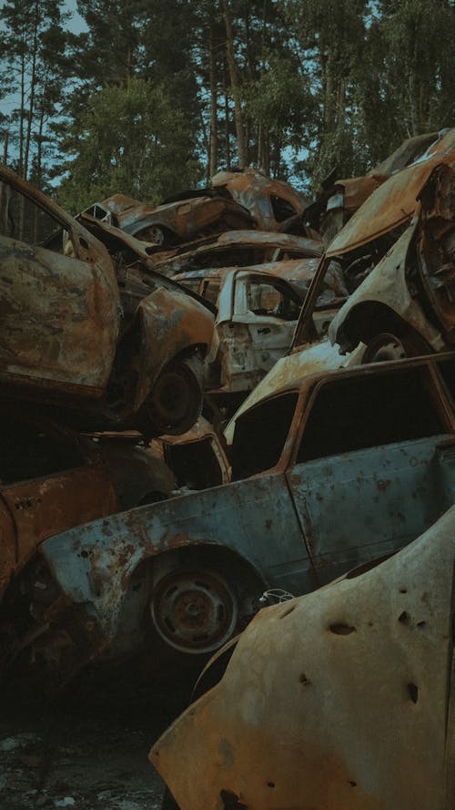 Rusty Junk Cars Stacked Up