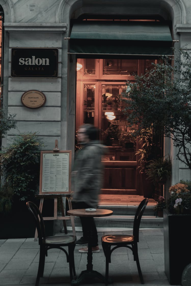 Blurred People In Front Of Restaurant