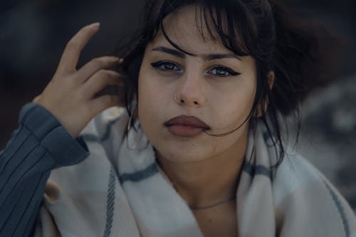 Brunette Woman with Hand in Hair