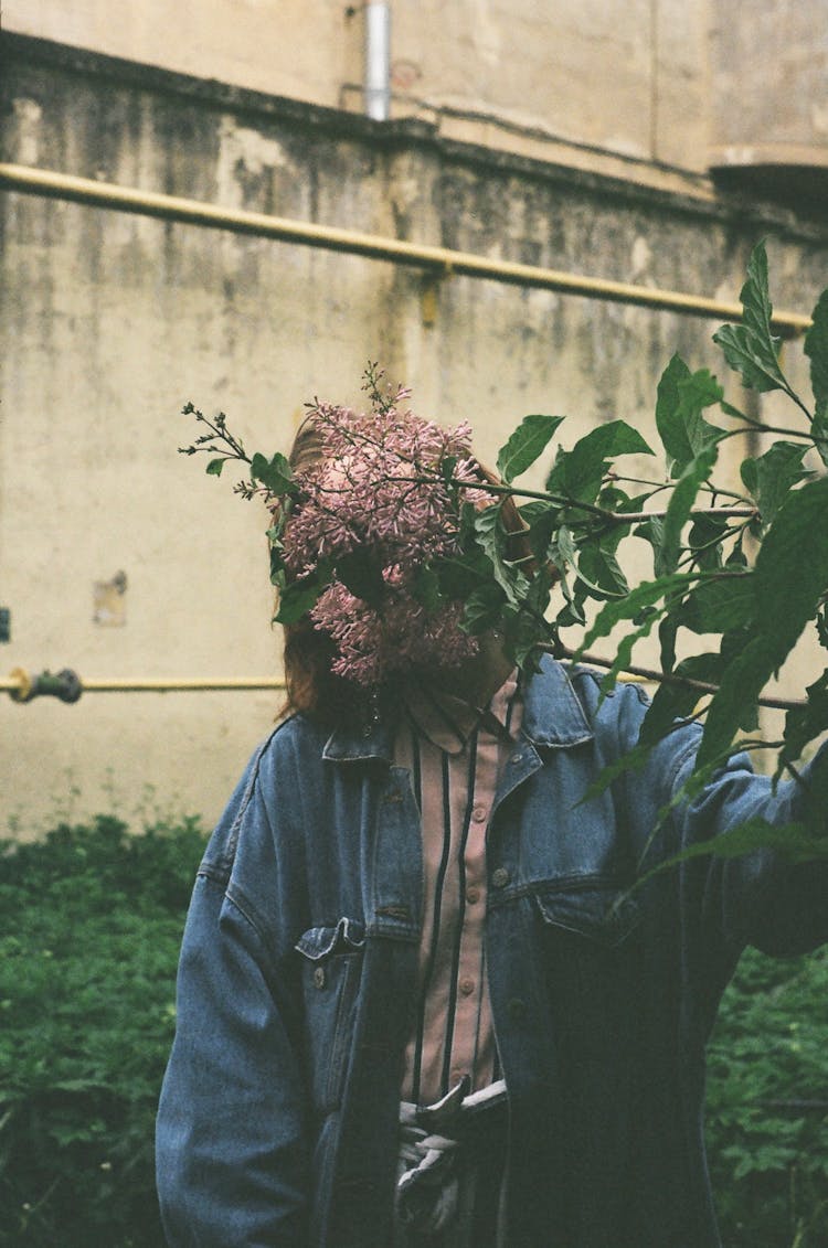 Woman Behind Flower Branch